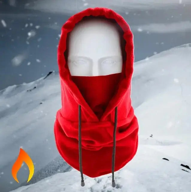 Cagoule capuche rouge pour femme ou homme sur un fond de montagne enneigée, idéale pour protéger du froid en hiver et lors des activités outdoor.