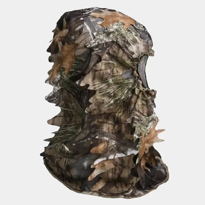 Cagoule filet camouflage vue de profil, avec un motif réaliste de feuillage et de branches, offrant une couverture intégrale pour une discrétion optimale dans les environnements boisés. Parfaite pour la chasse ou l'observation de la faune.