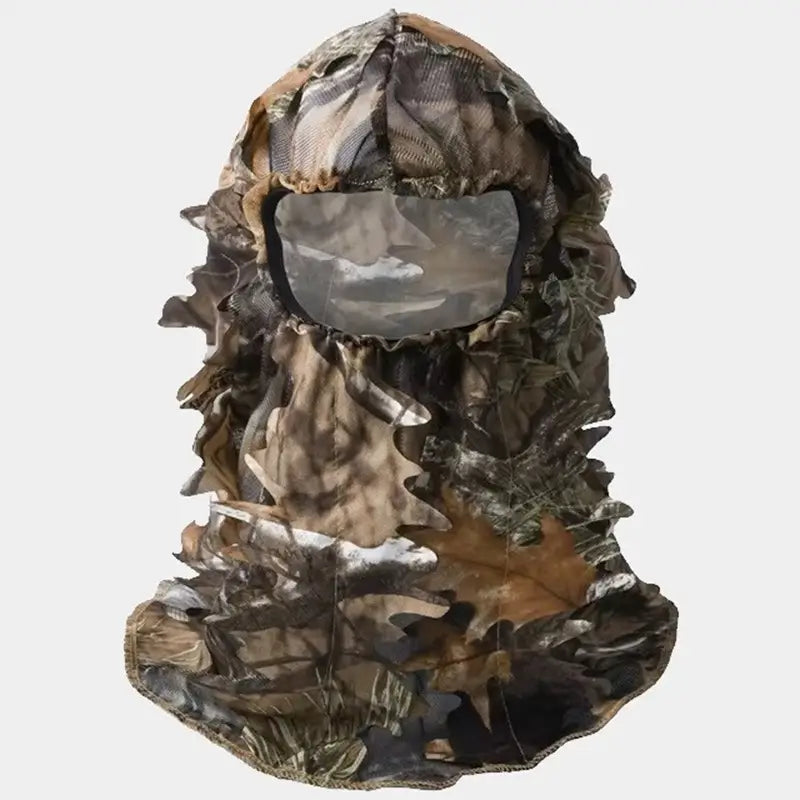 Cagoule filet camouflage intégrale avec motif réaliste de feuilles et de branches, conçue pour une discrétion maximale dans les environnements naturels. Idéale pour la chasse, l'observation de la faune.