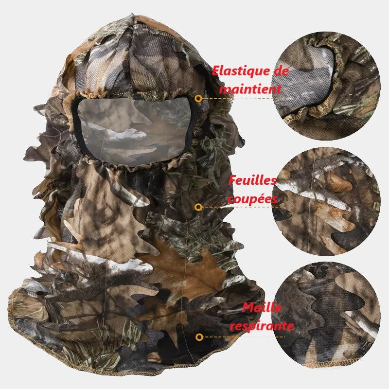 Cagoule filet camouflage avec des détails sur ses fonctionnalités : élastique de maintien pour un ajustement sécurisé, feuilles coupées pour un effet de camouflage réaliste, et maille respirante pour un confort optimal. Conçue pour la chasse, l'observation en forêt ou l'airsoft.