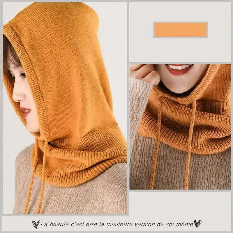 Femme portant une cagoule laine Femme orange avec cordons ajustables, vue rapprochée mettant en valeur la douceur du tricot et le confort chaud pour l'hiver