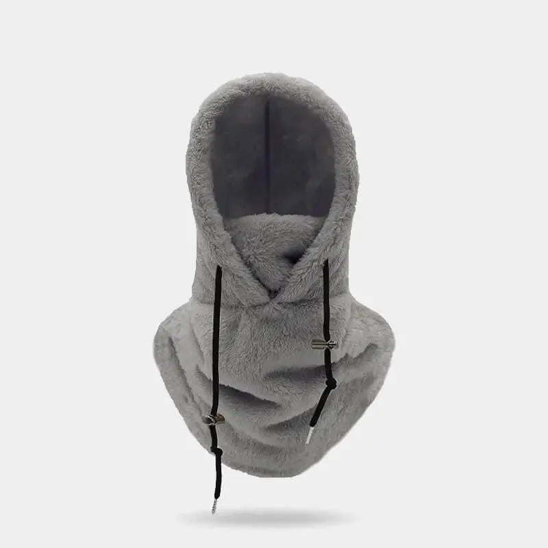 Cagoule sherpa grise avec doublure douce et cordons de serrage ajustables, parfaite pour protéger du froid et du vent, idéale pour les activités hivernales en extérieur.