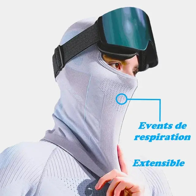 Cagoule Ski Femme couleur violine avec évents de respiration et matière extensible, idéale pour les activités hivernales.