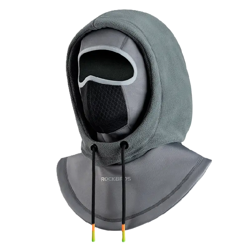 Cagoule ski multifonction grise avec design ergonomique, capuche polaire ajustable et filtre buccal respirant, parfaite pour le ski et les conditions hivernales.