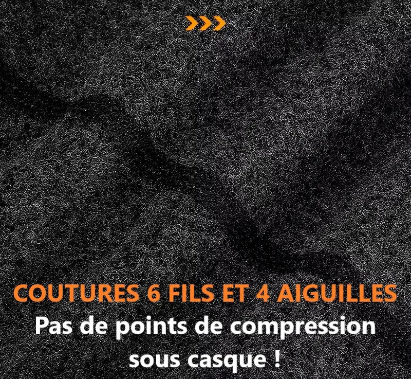 Gros plan sur les coutures renforcées à 6 fils et 4 aiguilles d'une cagoule vélo grand froid, garantissant l'absence de points de compression pour un confort optimal sous casque en hiver.